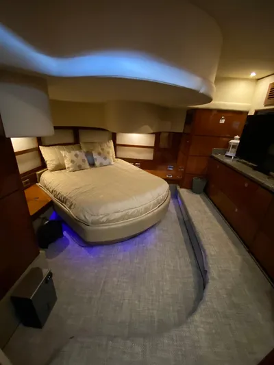 Dream Chaser Yacht Photos Pics Luxurious 2008 Sea Ray 47 Sedan Bridge yacht bedroom with ambient lighting and elegant decor.