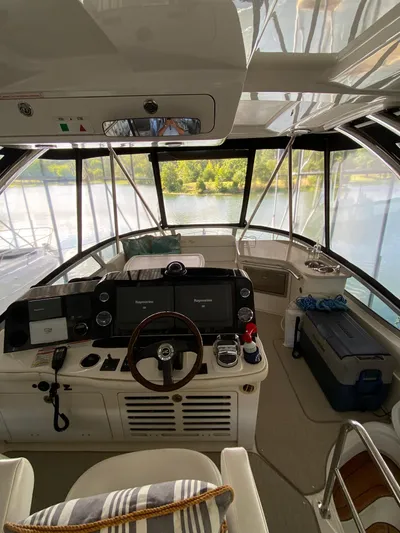 Dream Chaser Yacht Photos Pics 2008 Sea Ray 47 Sedan Bridge helm with modern controls and panoramic views.