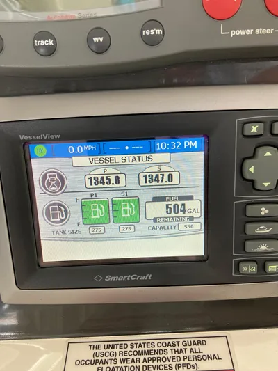 Dream Chaser Yacht Photos Pics VesselView display on 2008 Sea Ray 47 Sedan Bridge showing fuel status and engine hours.