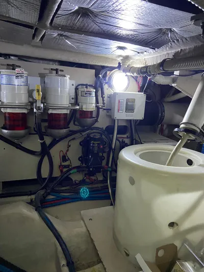 Dream Chaser Yacht Photos Pics Engine room of 2008 Sea Ray 47 Sedan Bridge with fuel filters and equipment.