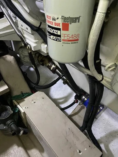 Dream Chaser Yacht Photos Pics Engine room of 2008 Sea Ray 47 Sedan Bridge with Fleetguard filter and hoses.