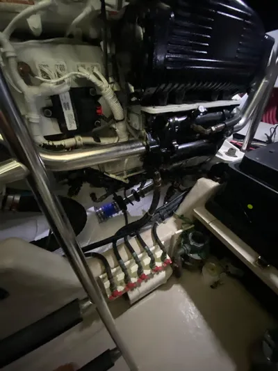 Dream Chaser Yacht Photos Pics Engine room of a 2008 Sea Ray 47 Sedan Bridge yacht, showcasing mechanical components.