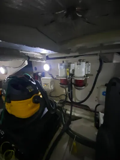 Dream Chaser Yacht Photos Pics Engine room of 2008 Sea Ray 47 Sedan Bridge with equipment and wiring.