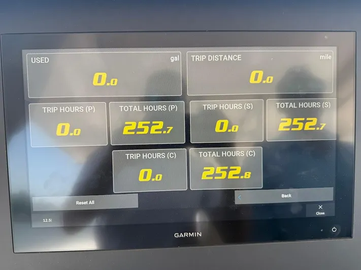  Yacht Photos Pics Garmin display on 2023 Everglades 395 Center Console showing trip and total hours data.