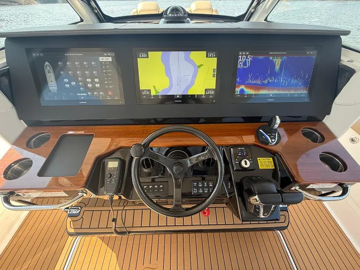  Yacht Photos Pics 2023 Everglades 395 Center Console dashboard with advanced navigation displays and controls.