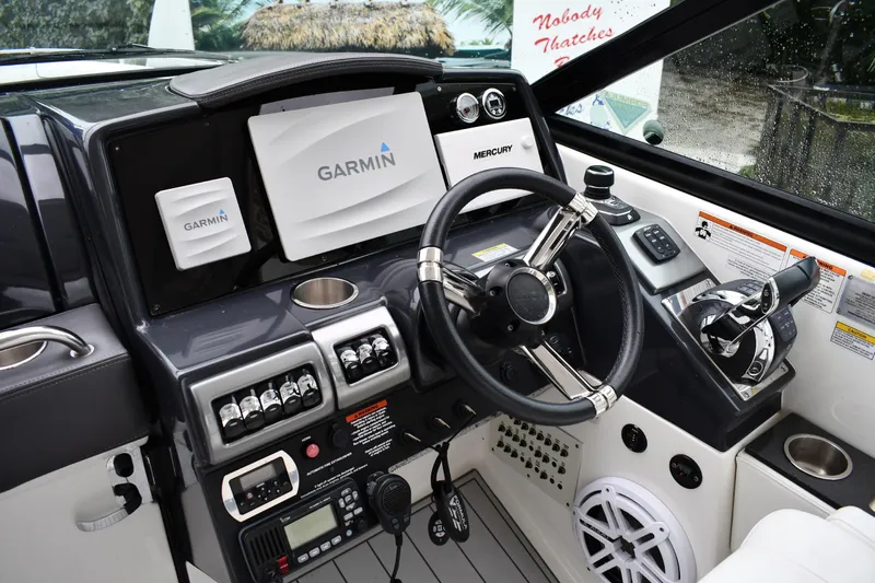 M/v Summer Wind Yacht Photos Pics 2018 Formula 350 Crossover Bowrider OB helm with Garmin and Mercury controls.