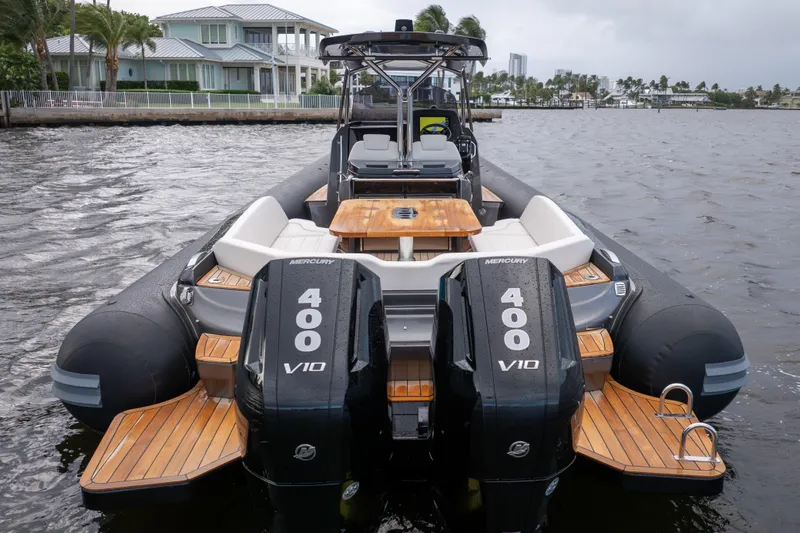 T/t Gypzy Yacht Photos Pics 2024 SACS Strider 11 boat with dual Mercury 400 V10 engines on water.