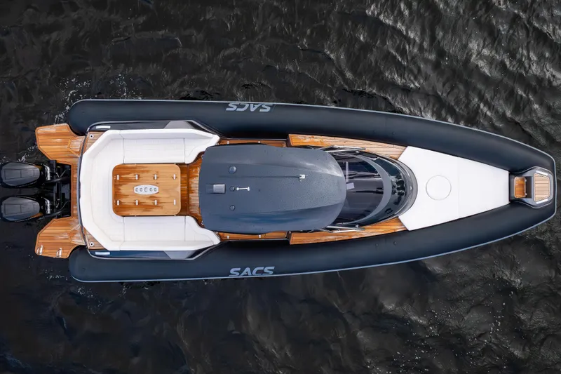 T/t Gypzy Yacht Photos Pics Top view of 2024 SACS Strider 11 luxury boat on water.