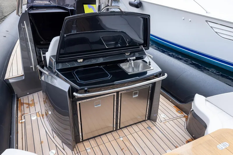 T/t Gypzy Yacht Photos Pics 2024 SACS Strider 11 yacht with sleek outdoor kitchen and modern design.