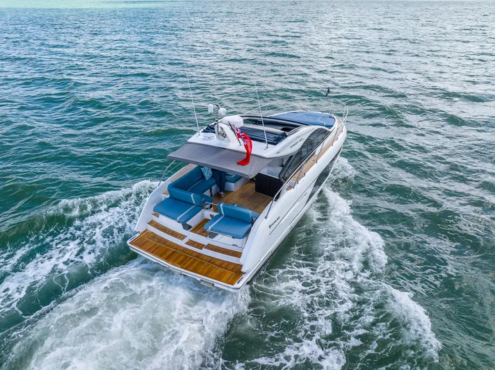 Availble To Order Yacht Photos Pics 2026 Fairline Targa 40 yacht cruising on open water, rear view.