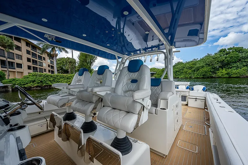  Yacht Photos Pics Luxurious 2016 HCB 53 Sueños boat interior with plush seating and sleek design.