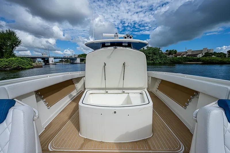  Yacht Photos Pics HCB 53 Sueños 2016 boat interior with open storage, scenic waterway view.