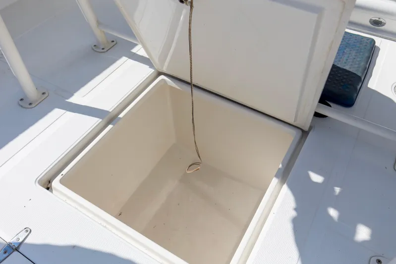 Miss Millie II Yacht Photos Pics Open storage compartment on 2003 Jupiter 31 Open boat deck.