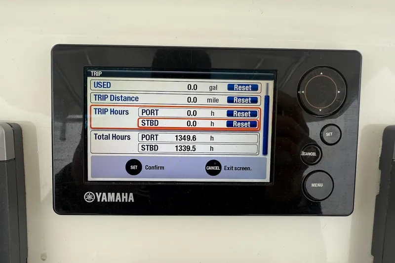  Yacht Photos Pics Yamaha display on 2013 Edgewater 318CC showing trip and total engine hours.