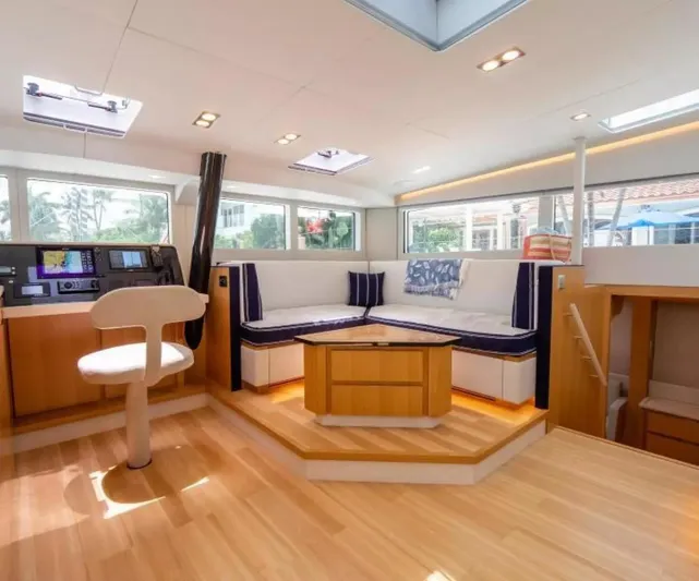  Yacht Photos Pics Luxurious interior of 2026 McConaghy MC63P Tourer yacht with modern seating and navigation area.