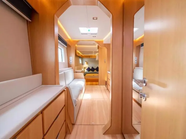  Yacht Photos Pics Luxurious interior of 2026 McConaghy MC63P Tourer yacht with modern wood finish.