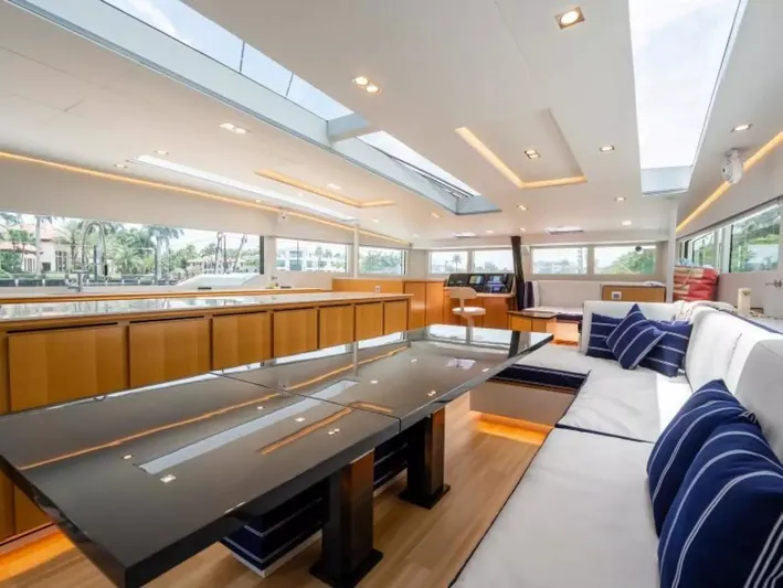  Yacht Photos Pics Luxurious interior of 2026 McConaghy MC63P Tourer yacht with modern design and spacious seating.