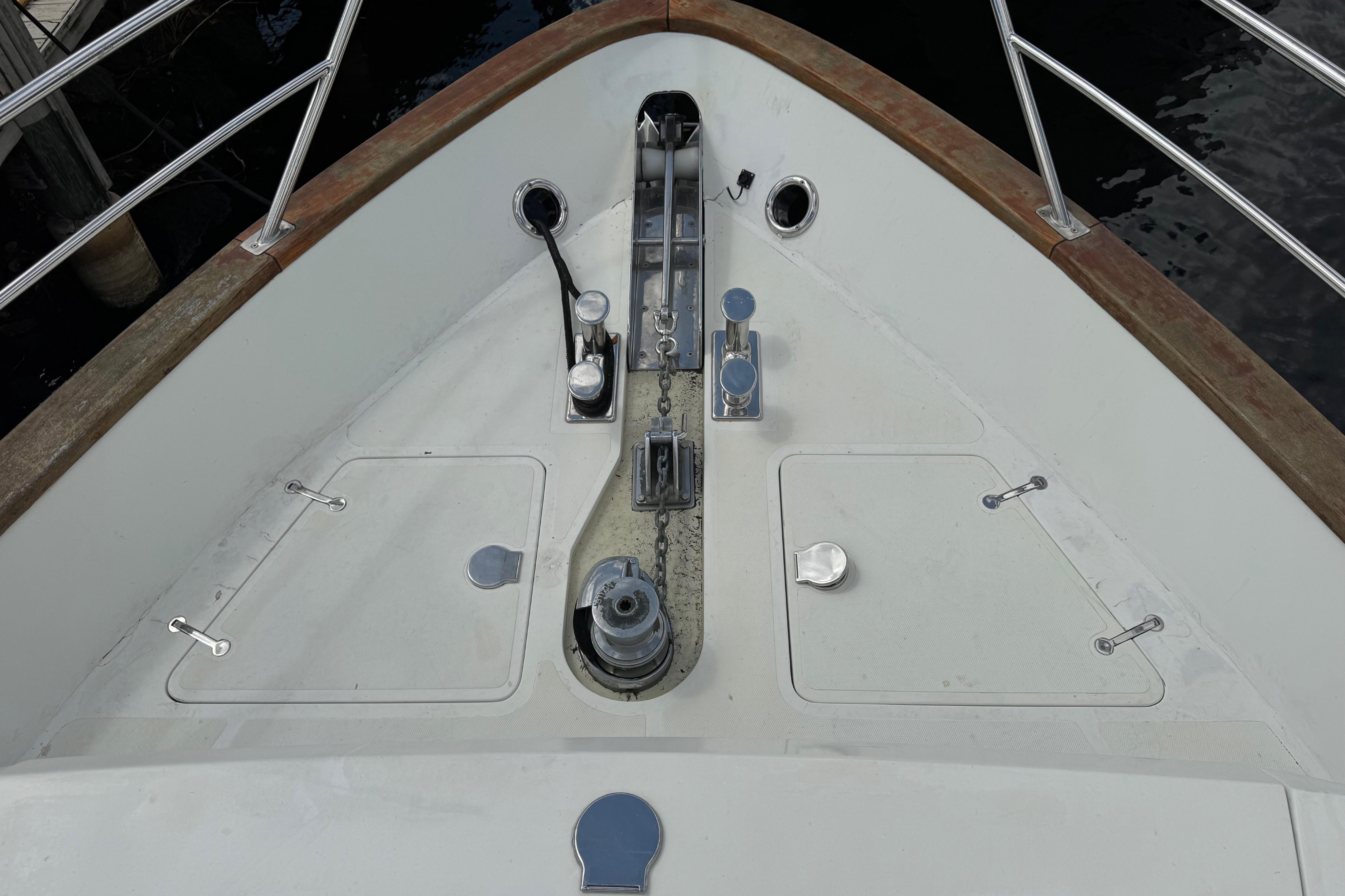 Bow deck of 2003 Custom Sea Star Pilot House with anchor chain and hatches.