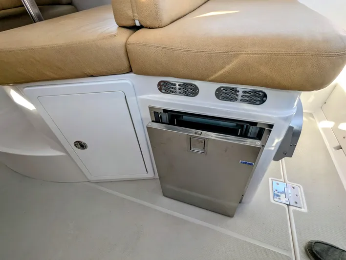 Grand Cove Yacht Photos Pics 2014 Back Cove 34 interior with seating and built-in stainless steel refrigerator.