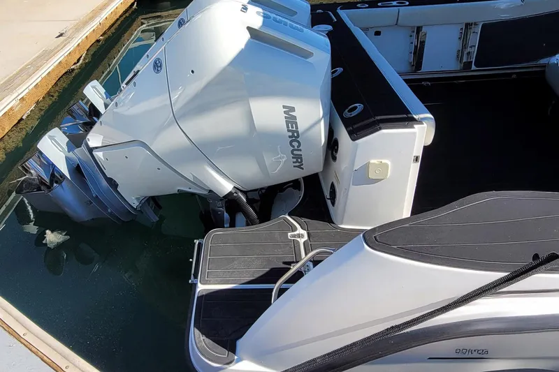 Outta Line Yacht Photos Pics 2017 Boston Whaler 315 Conquest with Mercury outboard engine at dock.
