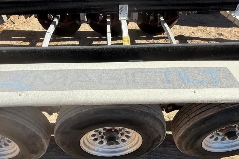 Outta Line Yacht Photos Pics Trailer for 2017 Boston Whaler 315 Conquest with Magic Tilt branding.