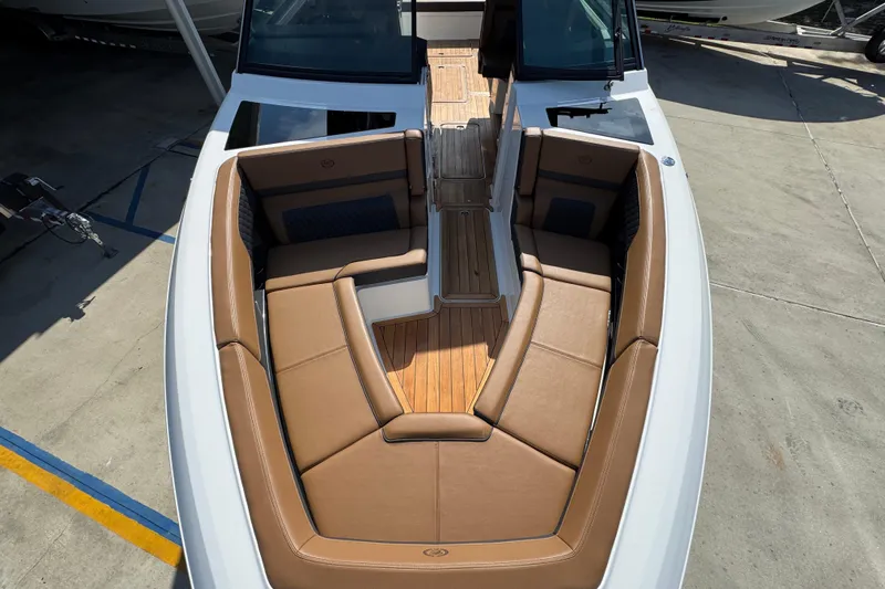  Yacht Photos Pics 2024 Cobalt R33 boat with luxurious tan seating and sleek design.