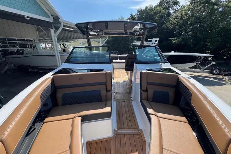  Yacht Photos Pics 2024 Cobalt R33 boat interior with luxurious seating and sleek design.