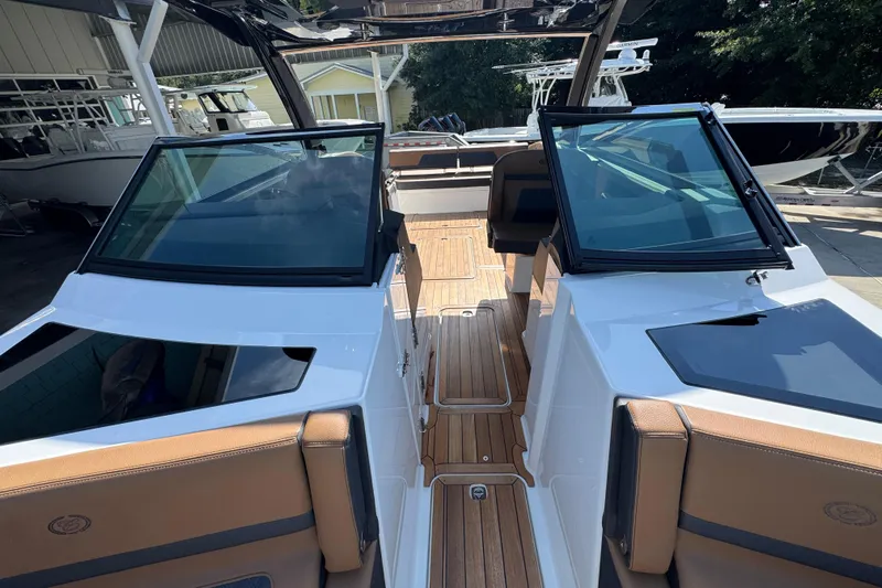  Yacht Photos Pics 2024 Cobalt R33 boat interior with sleek design and modern features.