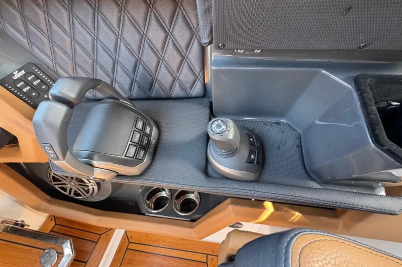  Yacht Photos Pics 2024 Cobalt R33 boat control panel with joystick and throttle levers.