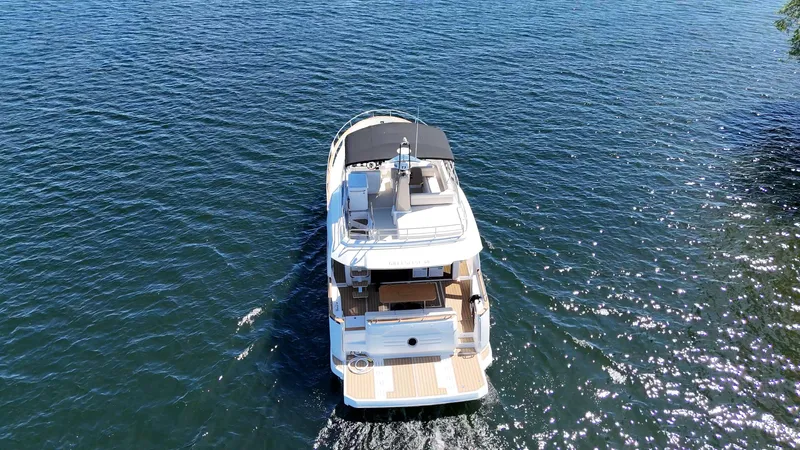  Yacht Photos Pics 2024 Greenline 48 Fly yacht cruising on open water.