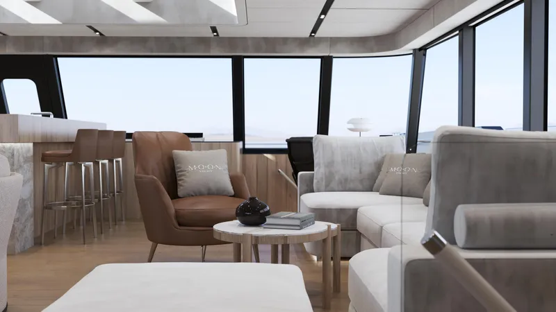 Moon Yacht 100s Yacht Photos Pics Luxurious interior of 2027 Moon 100 Sail yacht with modern seating and panoramic windows.