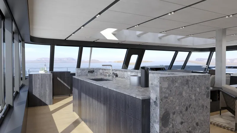 Moon Yacht 100s Yacht Photos Pics Luxurious interior of 2027 Moon 100 Sail yacht with modern kitchen and panoramic windows.