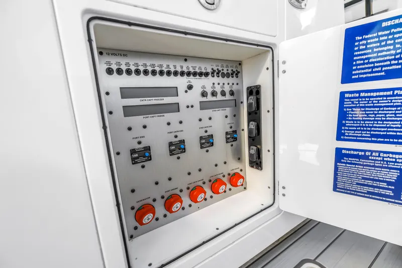 Best Deal Yacht Photos Pics Control panel of 2023 HCB 53 Suenos RXV boat with switches and waste management instructions.
