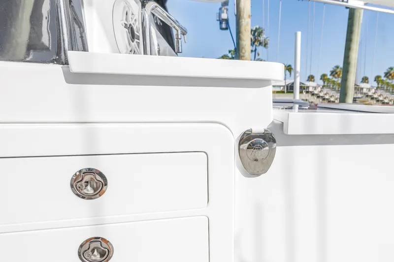 Best Deal Yacht Photos Pics 2023 HCB 53 Suenos RXV boat detail with sleek white finish and chrome accents.