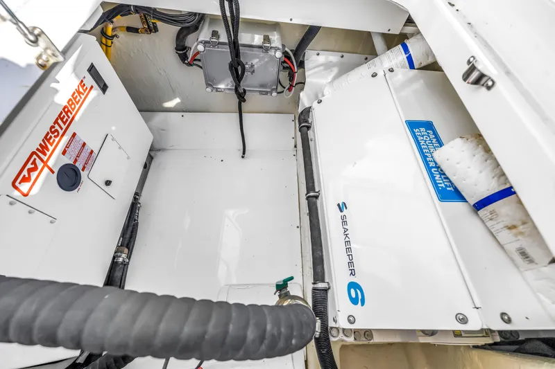 Best Deal Yacht Photos Pics Engine room of 2023 HCB 53 Suenos RXV with Westerbeke and Seakeeper systems.