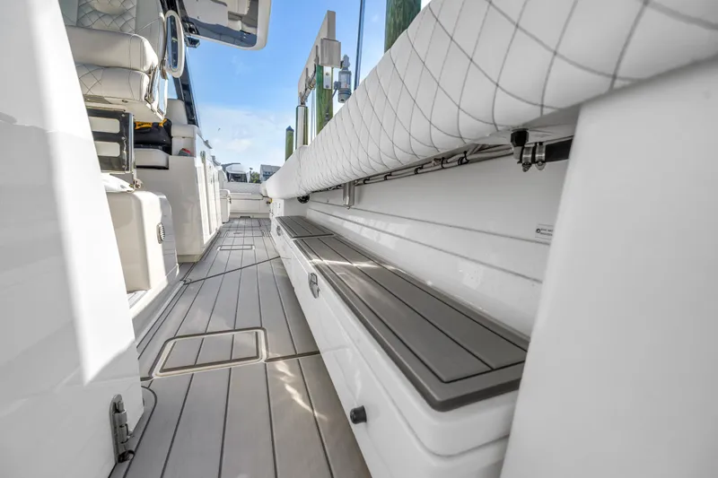 Best Deal Yacht Photos Pics 2023 HCB 53 Suenos RXV boat interior with sleek seating and modern design.