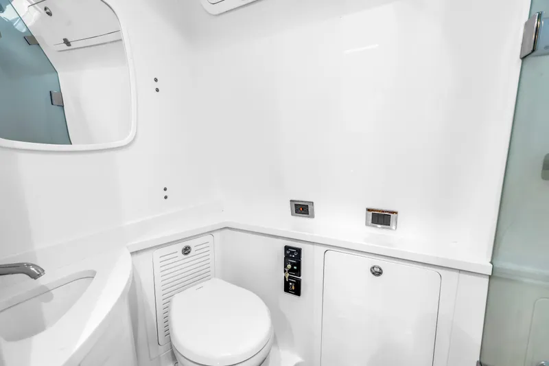 Best Deal Yacht Photos Pics 2023 HCB 53 Suenos RXV yacht bathroom with modern fixtures and sleek design.