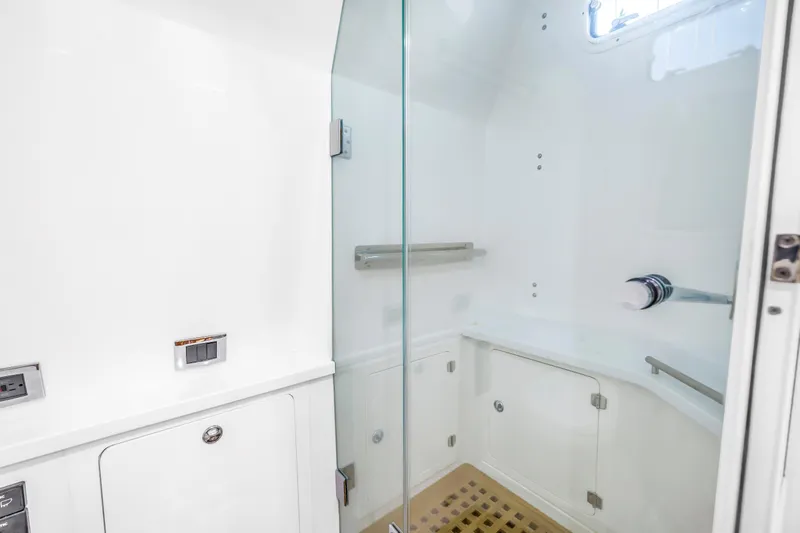 Best Deal Yacht Photos Pics Luxurious bathroom interior of 2023 HCB 53 Suenos RXV yacht with modern fixtures.