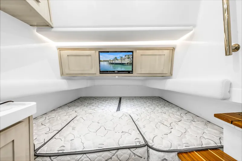 Best Deal Yacht Photos Pics Interior cabin of 2023 HCB 53 Suenos RXV with bed and TV.