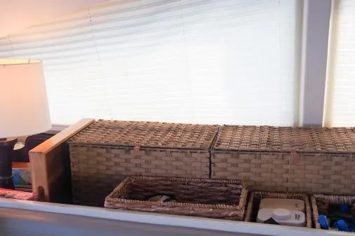 Pilar Yacht Photos Pics Wicker baskets and lamp inside 2015 Robertson & Caine Leopard 48 yacht interior.