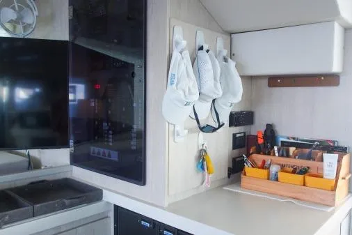 Pilar Yacht Photos Pics Interior of 2015 Robertson & Caine Leopard 48 yacht with organized kitchen area.