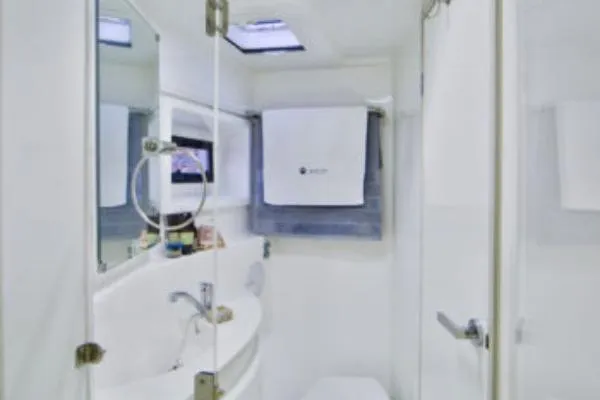 Pilar Yacht Photos Pics Luxurious bathroom interior of 2015 Robertson & Caine Leopard 48 yacht.