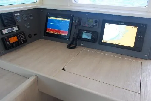 Pilar Yacht Photos Pics 2015 Robertson & Caine Leopard 48 yacht navigation panel with modern electronic displays.