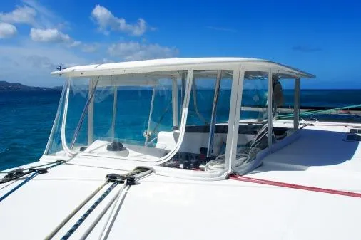 Pilar Yacht Photos Pics 2015 Robertson & Caine Leopard 48 catamaran on blue ocean under clear sky.
