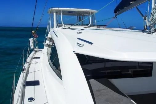 Pilar Yacht Photos Pics 2015 Robertson & Caine Leopard 48 yacht on clear blue ocean.