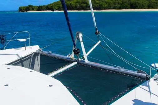Pilar Yacht Photos Pics 2015 Robertson & Caine Leopard 48 catamaran sailing near tropical island.
