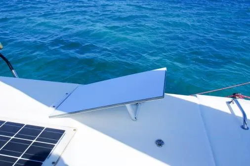 Pilar Yacht Photos Pics 2015 Robertson & Caine Leopard 48 yacht with solar panel on deck, ocean background.