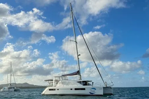 Pilar Yacht Photos Pics 2015 Robertson & Caine Leopard 48 catamaran sailing on a sunny day.