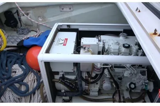 Pilar Yacht Photos Pics Engine compartment of 2015 Robertson & Caine Leopard 48 yacht with ropes and equipment.