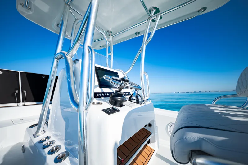  Yacht Photos Pics 2016 Barker Boatworks 26 Calibogue Bay helm with ocean view and sleek design.